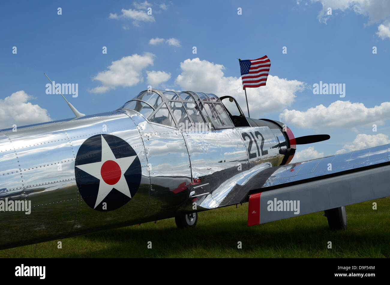 A BT-13 Valiant trainer aircraft with American Flag. Stock Photo