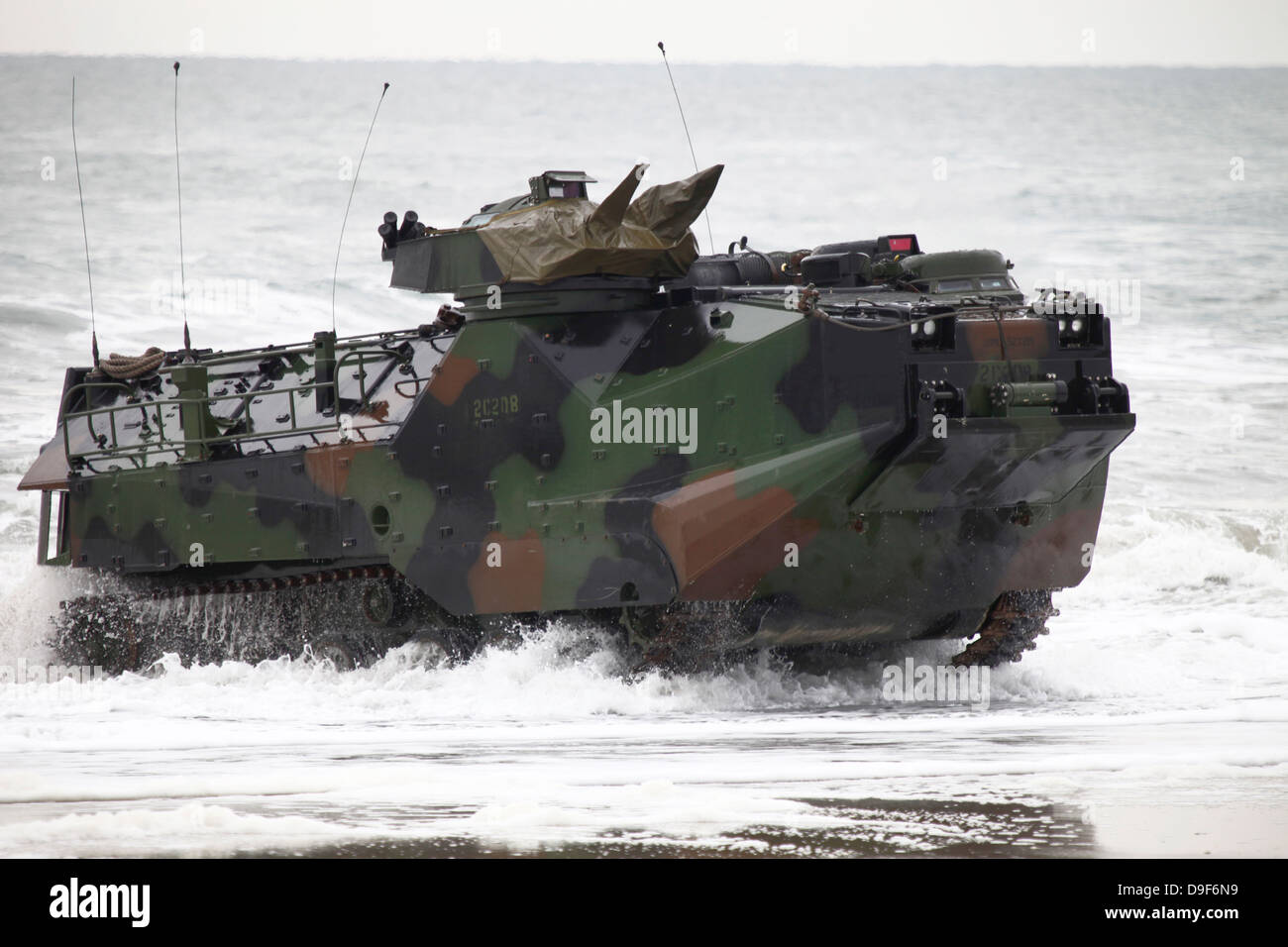 An amphibious assault vehicle drives toward Onslow Beach. Stock Photo