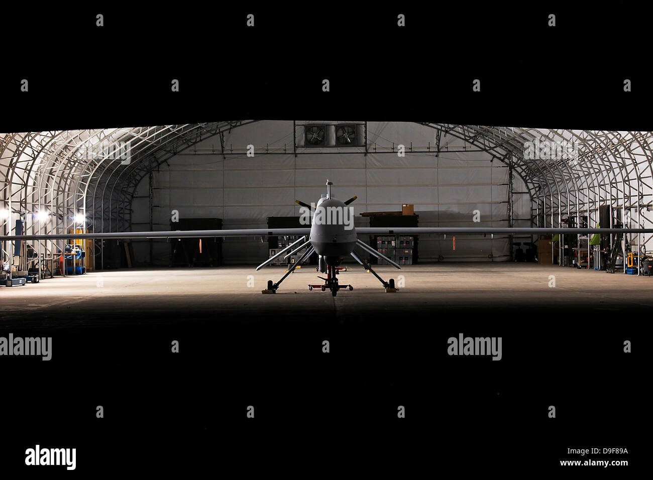 January 12, 2010 - An MQ-1C Sky Warrior unmanned aerial vehicle is parked in a hangar at Camp Taji, Iraq. Stock Photo