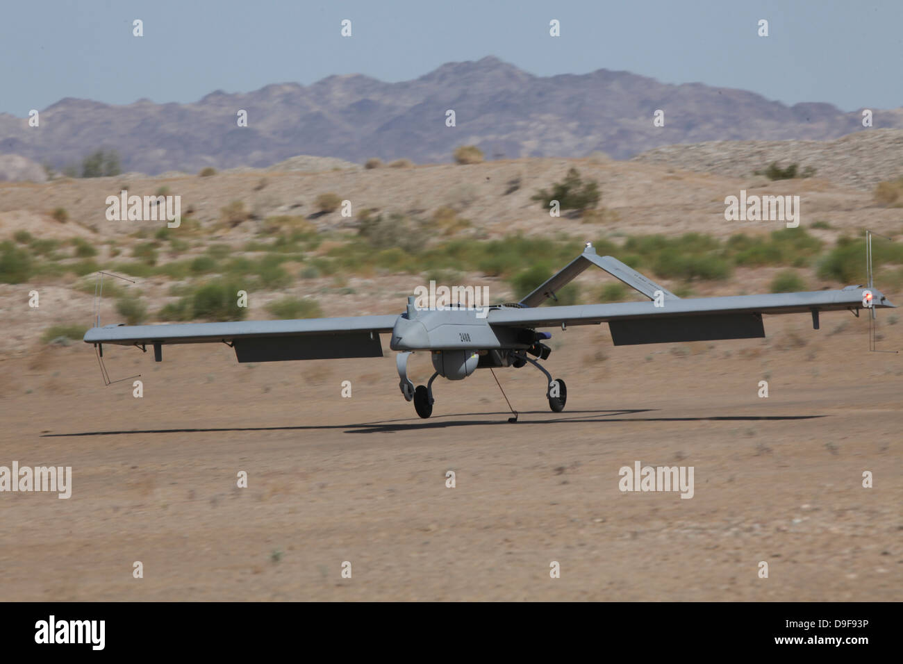 An RQ-7B Shadow unmanned aerial vehicle prepares to land. Stock Photo
