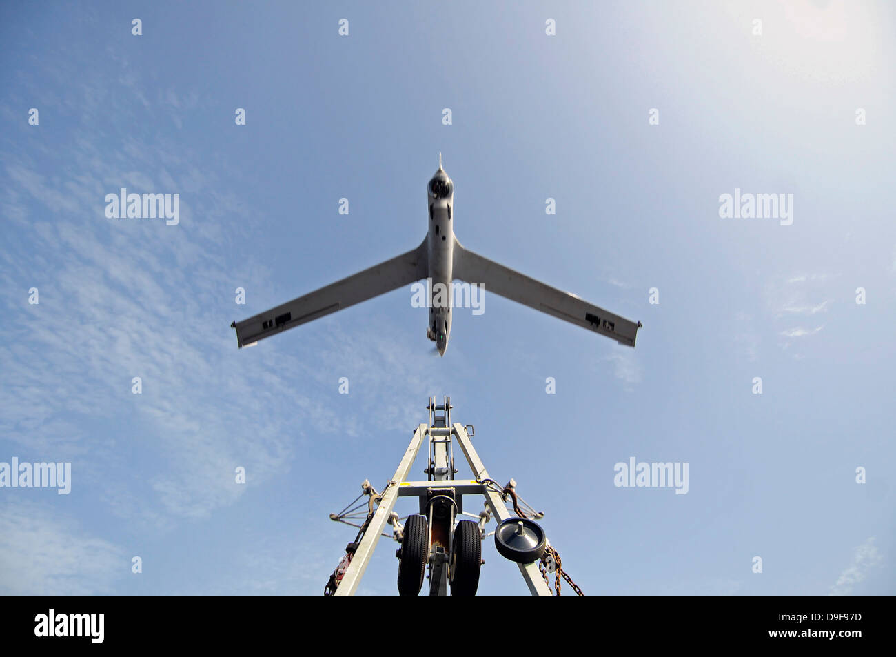 A ScanEagle unmanned aerial vehicle launches from its catapult. Stock Photo