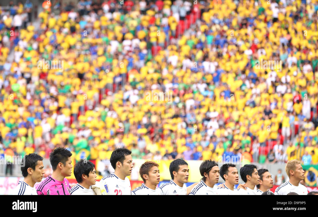 Japan team group line-up (JPN), JUNE 15, 2013 - Football / Soccer : Japanese players (L-R) Makoto Hasebe, Eiji Kawashima, Atsuto Uchida, Maya Yoshida, Hiroshi Kiyotake, Yasuyuki Konno, Yasuhito Endo, Shinji Okazaki, Shinji Kagawa, Yuto Nagatomo and Keisuke Honda listen to their national anthem before the FIFA Confederations Cup Brazil 2013, Group A match between Brazil 3-0 Japan at Estadio Nacional, Brasilia, Brazil.   (Photo by Kenzaburo Matsuoka/AFLO) Stock Photo