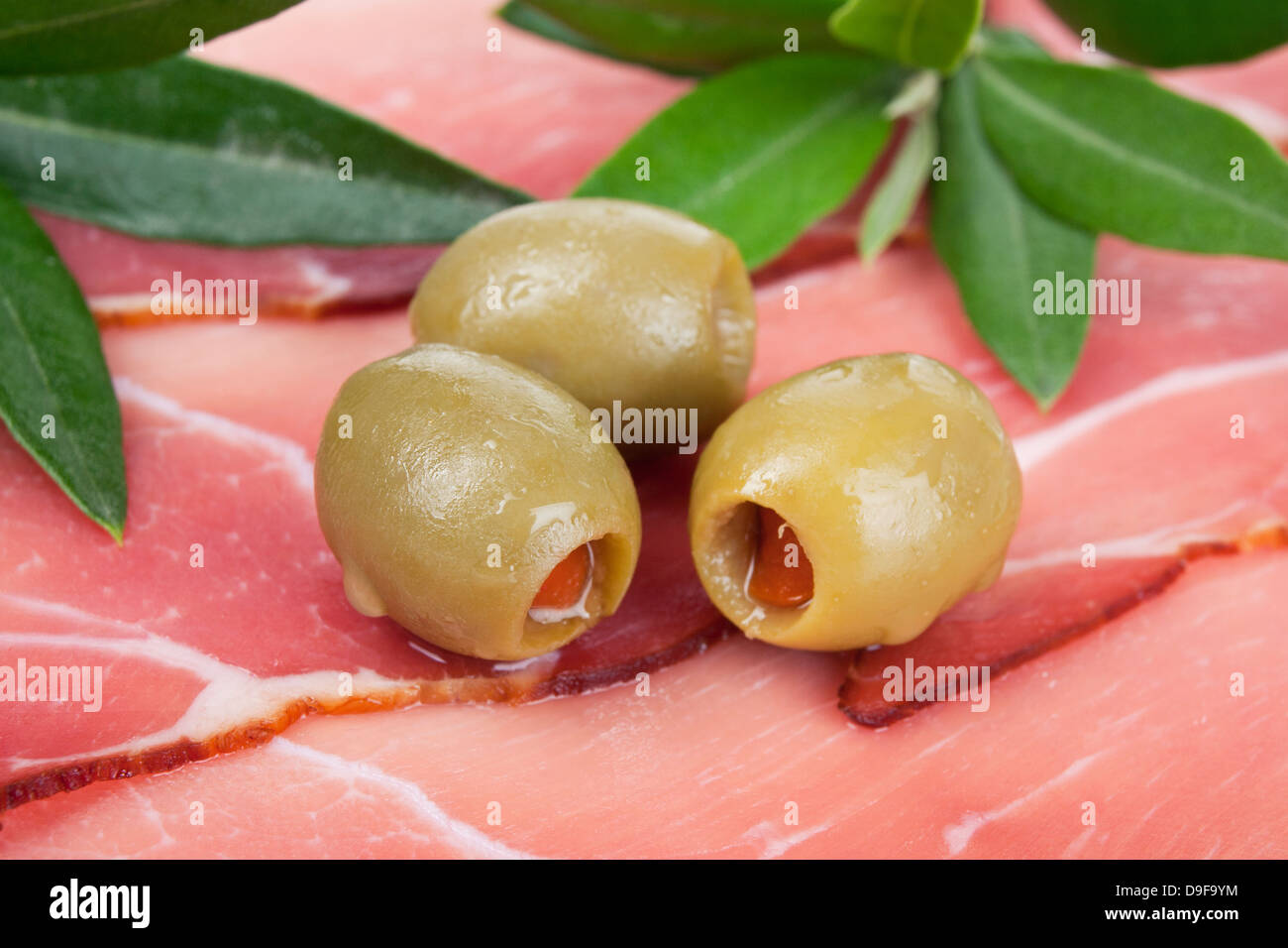 Ham with green olive Ham and green olive Stock Photo
