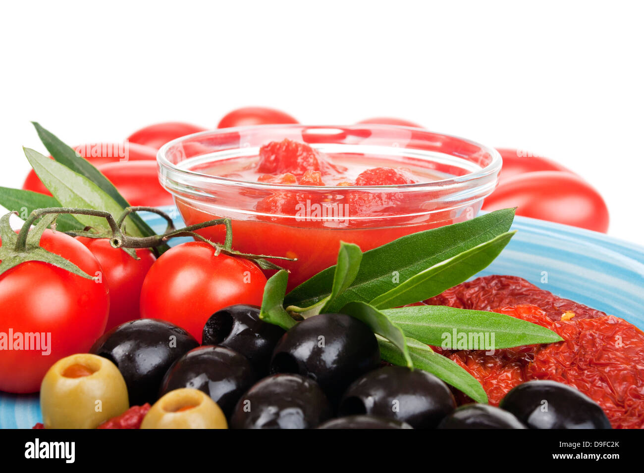 Passed tomatoes, shrub tomatoes, dry tomatoes and olive Crushed tomatoes, tomatoes, dried tomatoes and olive Stock Photo