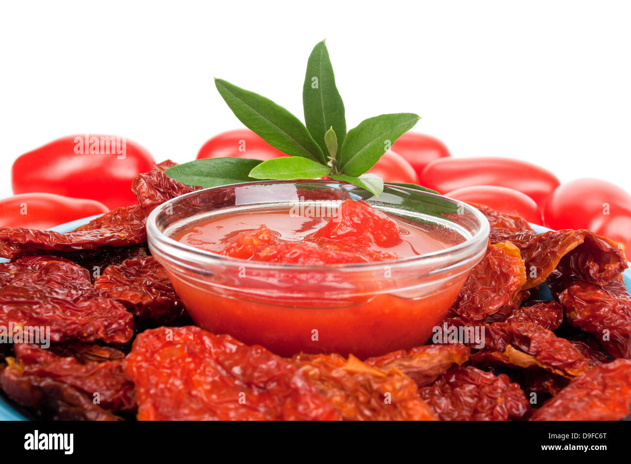 Passed tomatoes, bottle tomatoes and dry tomatoes Crushed tomatoes, plum tomatoes and dried tomatoes Stock Photo
