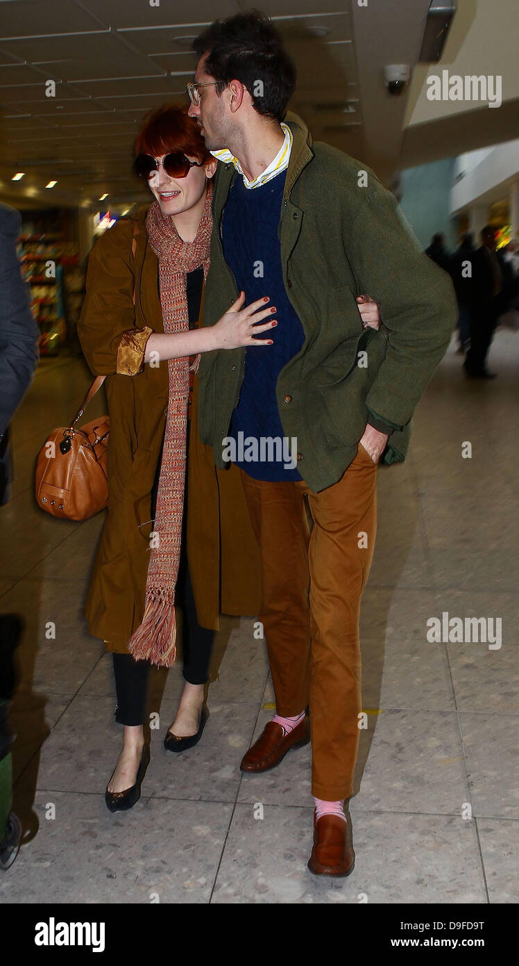 Florence Welch and her boyfriend Stuart Hammond arriving at Heathrow