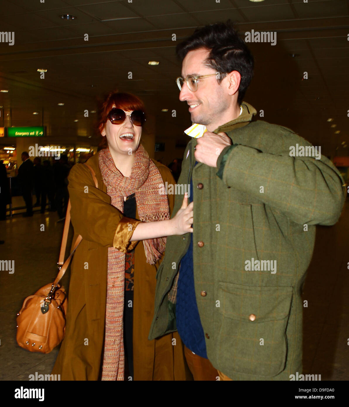 Florence Welch and her boyfriend Stuart Hammond arriving at Heathrow