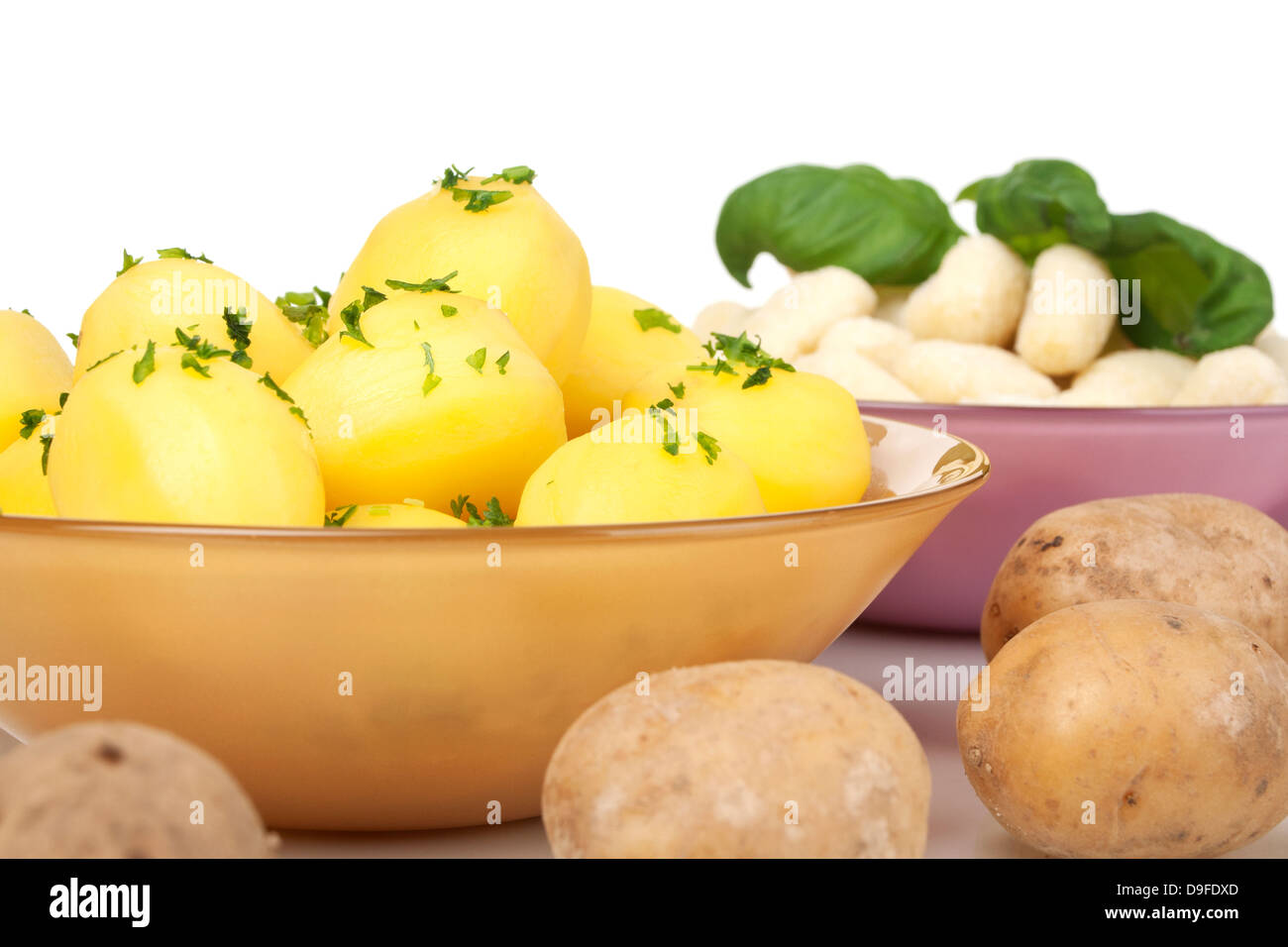 Cooked potatoes and Gnocchis Boiled potatoes and gnocchi Stock Photo