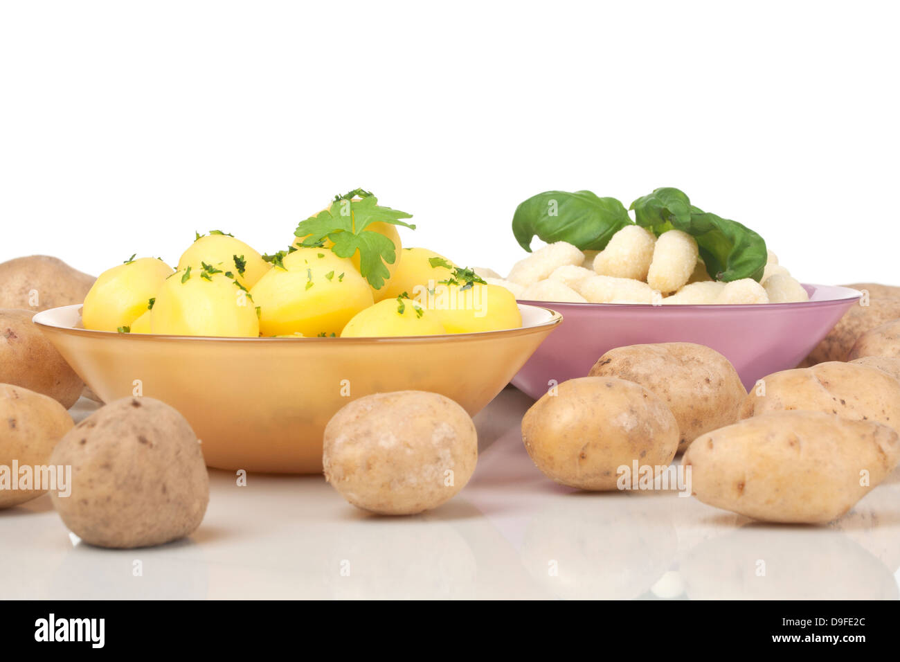 Cooked potatoes and Gnocchis Boiled potatoes and gnocchi Stock Photo
