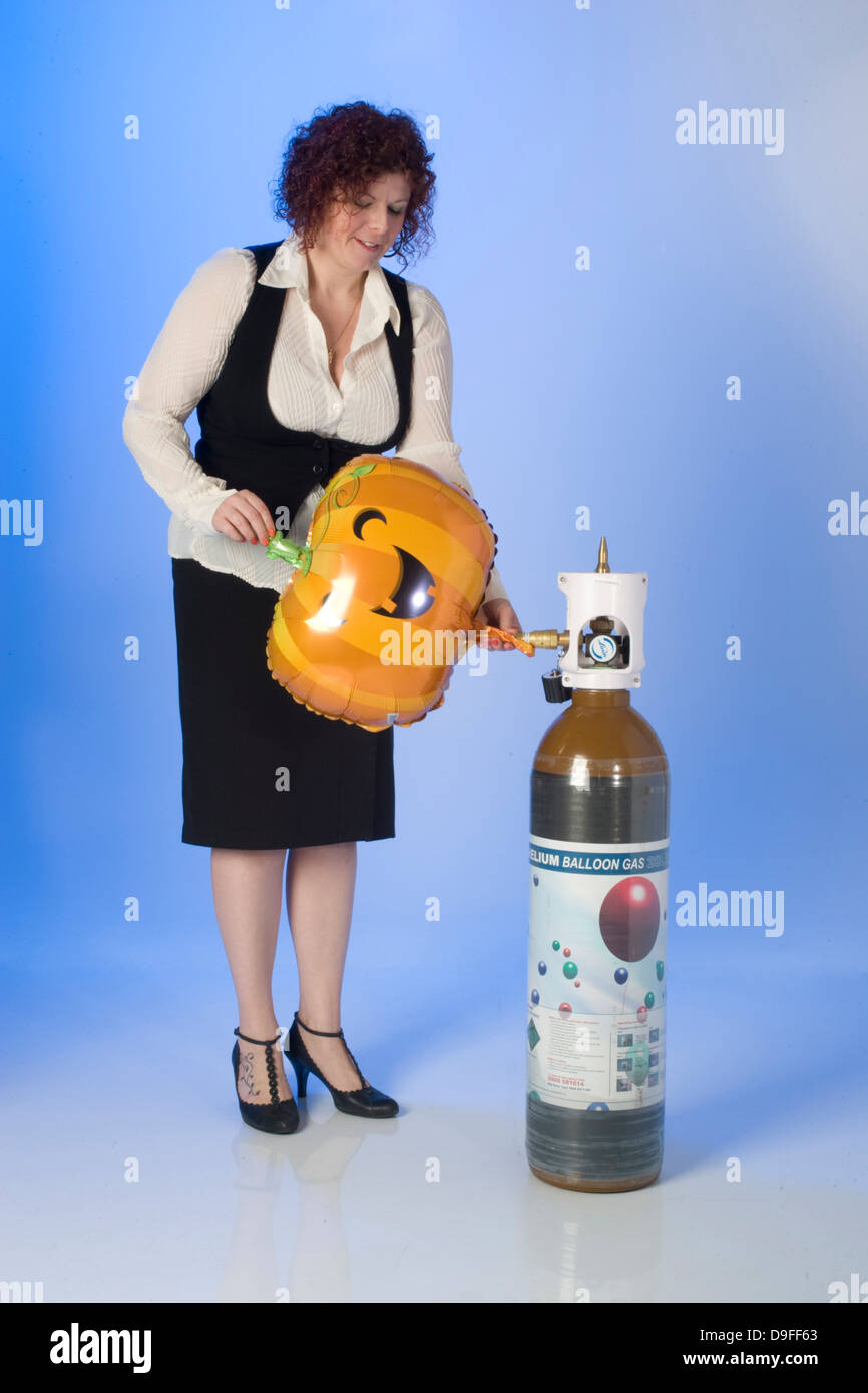 Helium balloons cylinders hi-res stock photography and images - Alamy