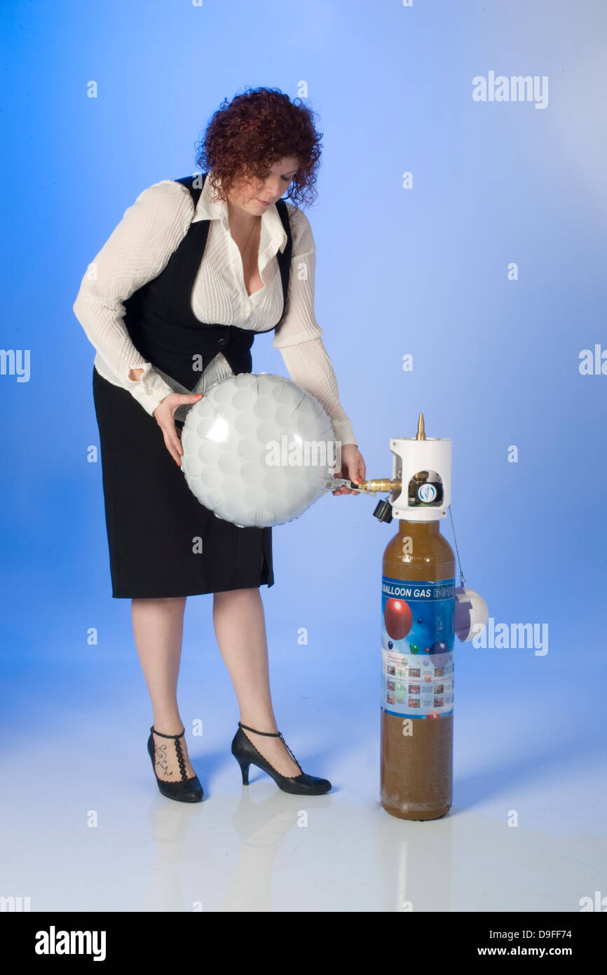 Helium balloons cylinders hires stock photography and images Alamy