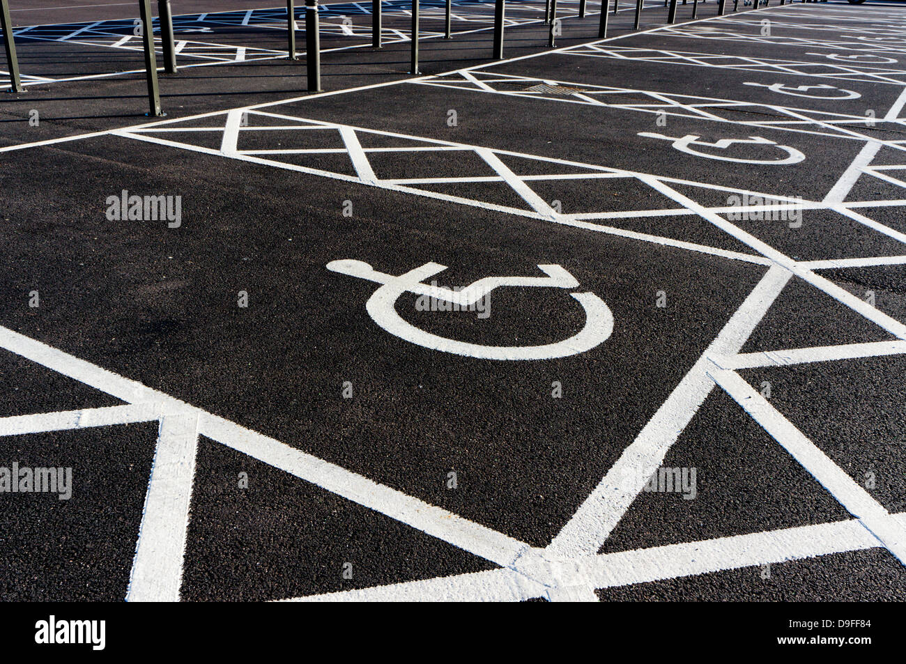 Disabled parking spaces in a supermarket car park. Stock Photo