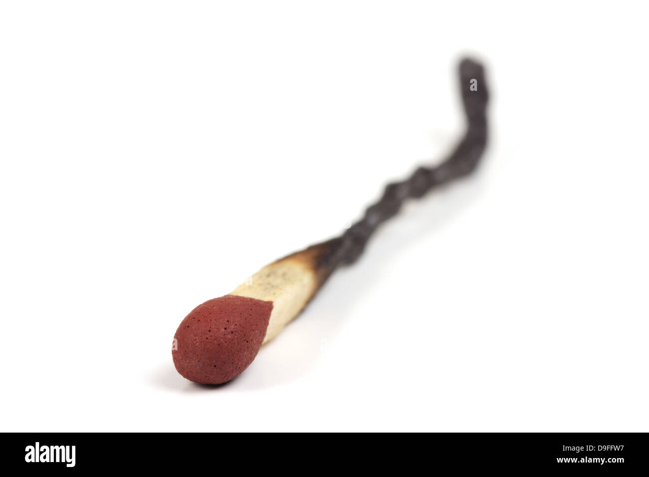 Ein verkehrt herum abgebranntes Streichholz |An upside-burnt-match| Stock Photo