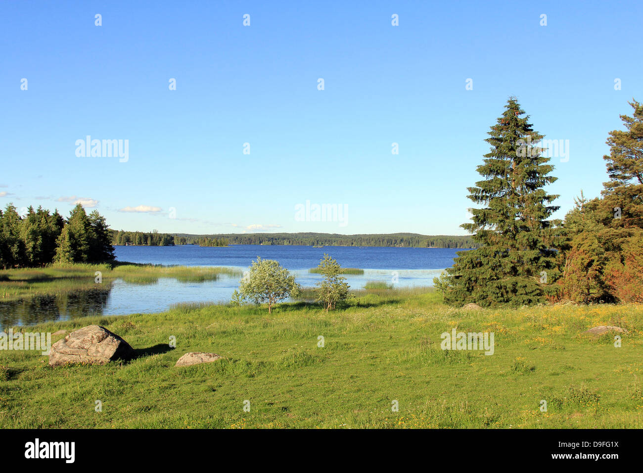 Lake scenery to Sunttionlahti, Rautavesi in Sastamala, Finland on a sunny summer evening. Stock Photo