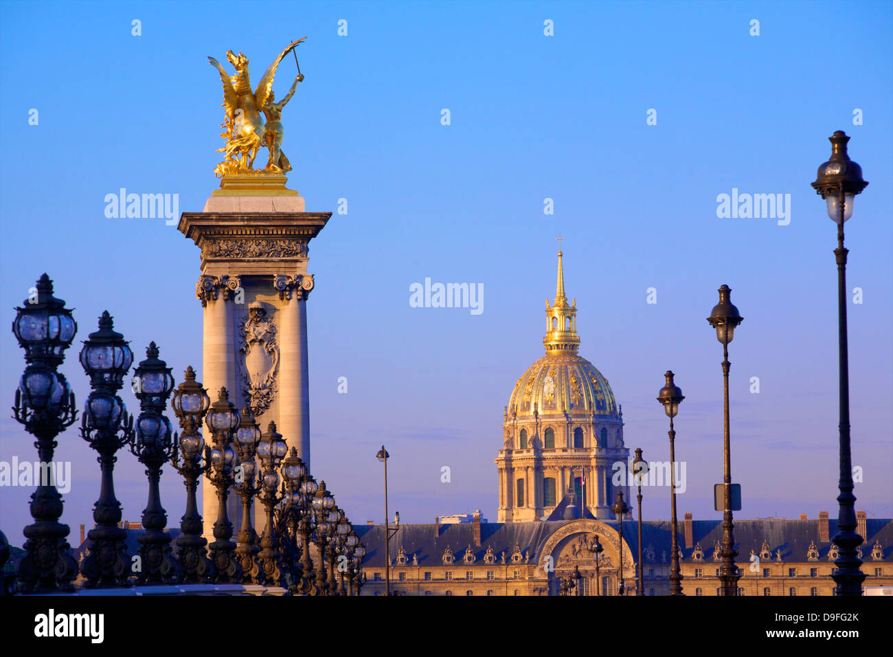 Pont Alexandre III with Chapel of Saint-Louis-des-Invalides in the background, Paris, France Stock Photo