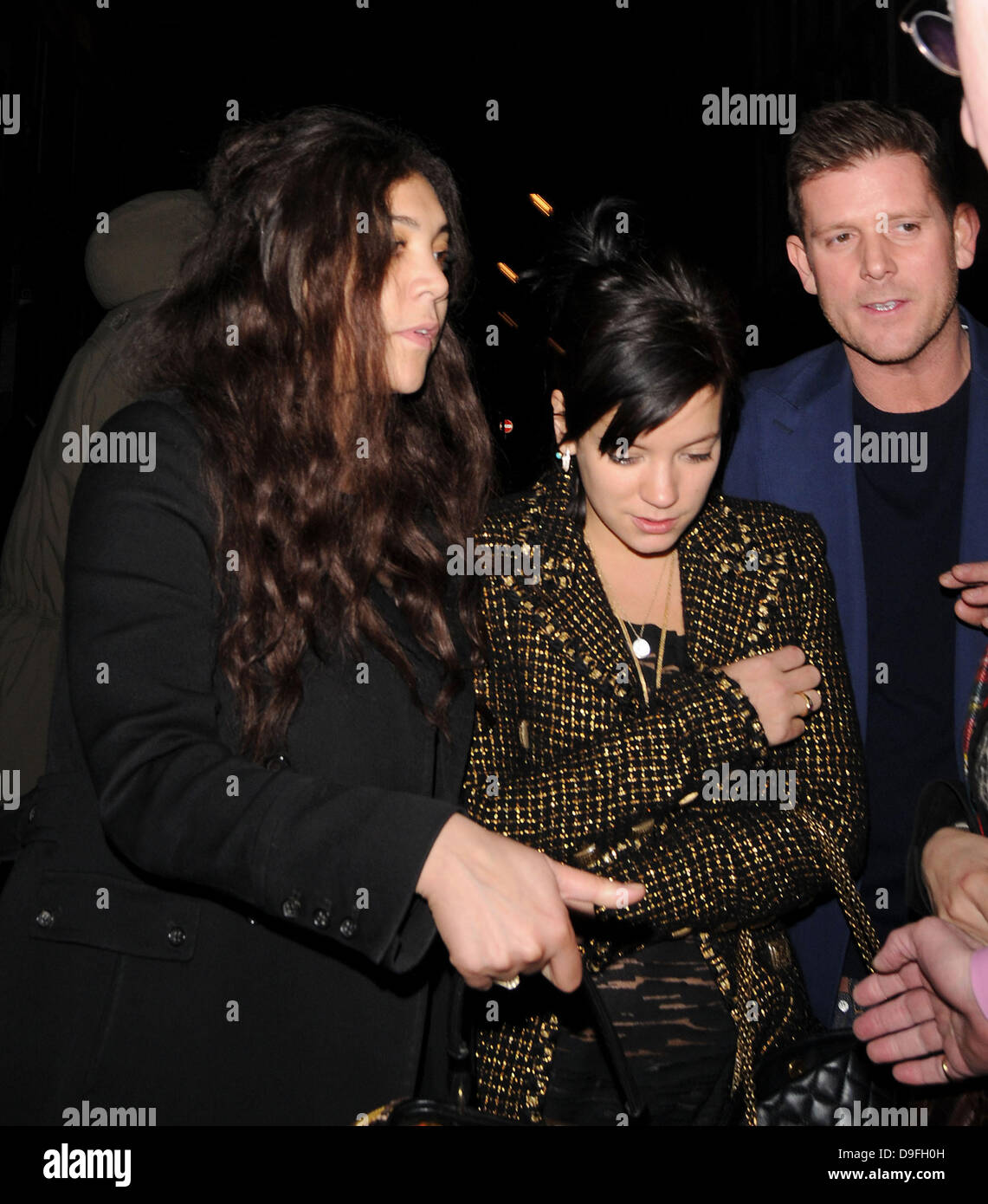 Lily Allen and Miquita Oliver , leaving the Groucho club. London
