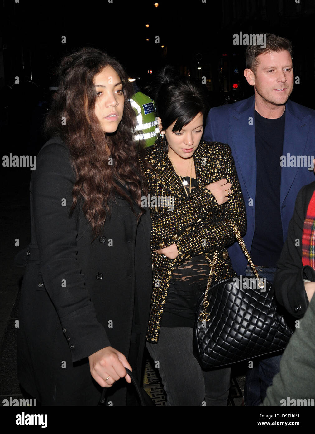 Lily Allen and Miquita Oliver , leaving the Groucho club. London
