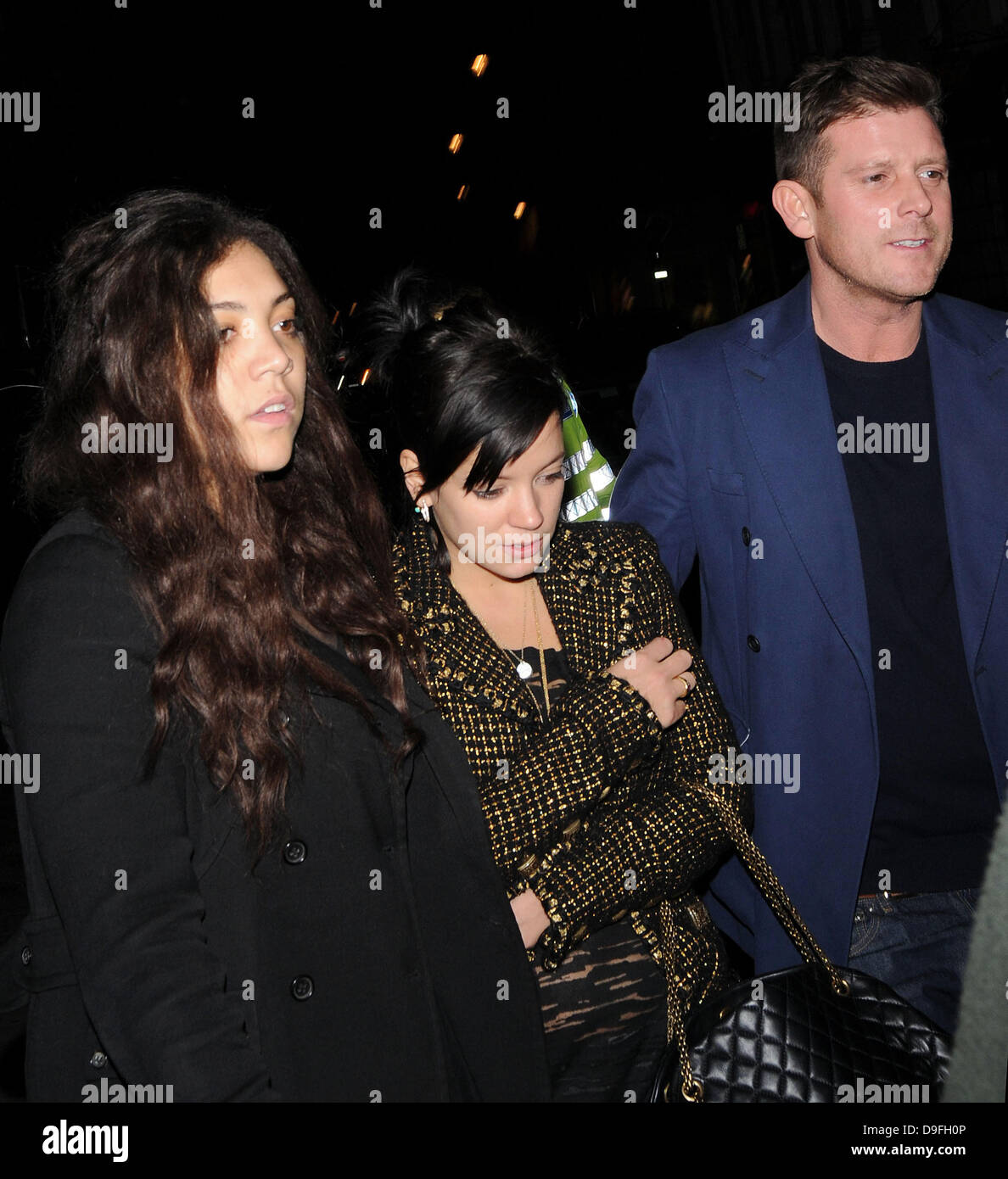 Lily Allen and Miquita Oliver , leaving the Groucho club. London