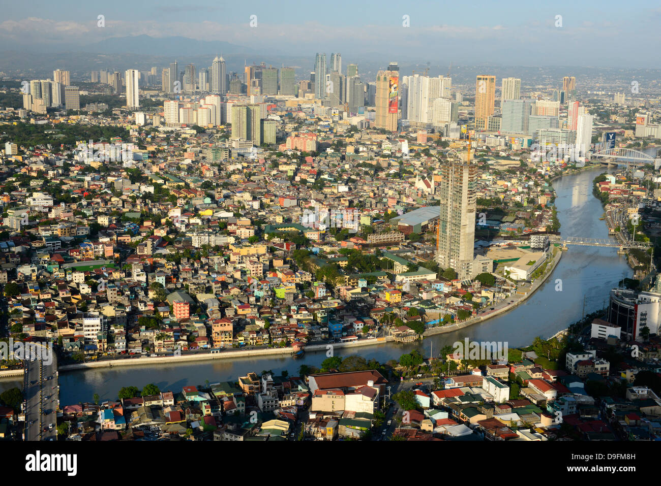 Tall buildings on Ortiga Avenue, Pasig River and Mandaluyong beyond, Metromanila, Philippines, Southeast Asia Stock Photo
