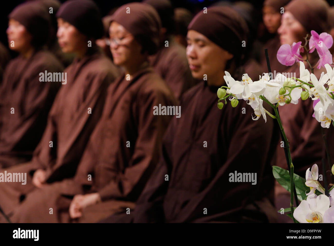 Buddhist nuns meditating, La Defense, Hauts-de-Seine, France Stock Photo