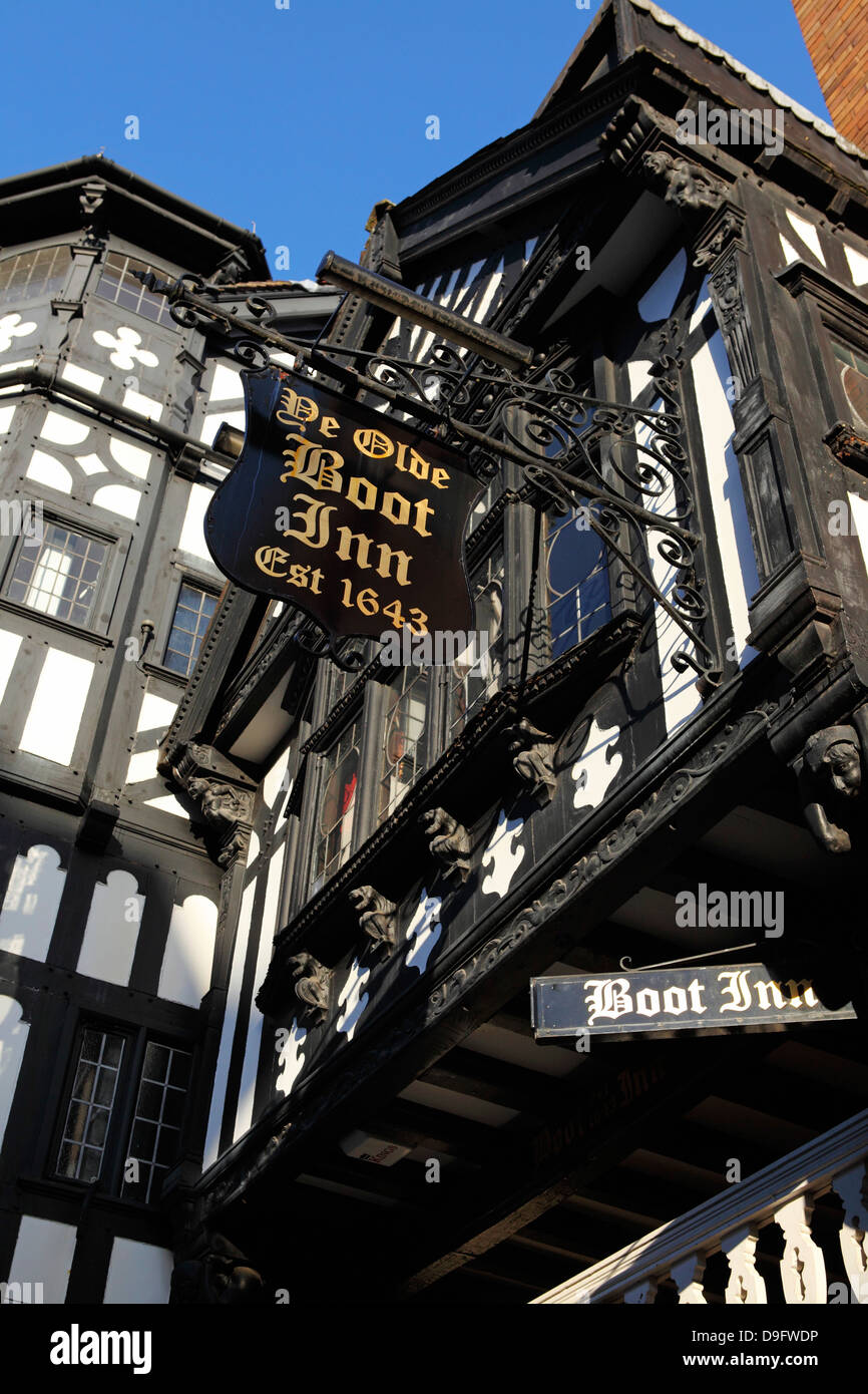 The half-timbered facade of Ye Olde Boot Inn, dating from 1643, a traditional British pub, in Chester, Cheshire, England, UK Stock Photo