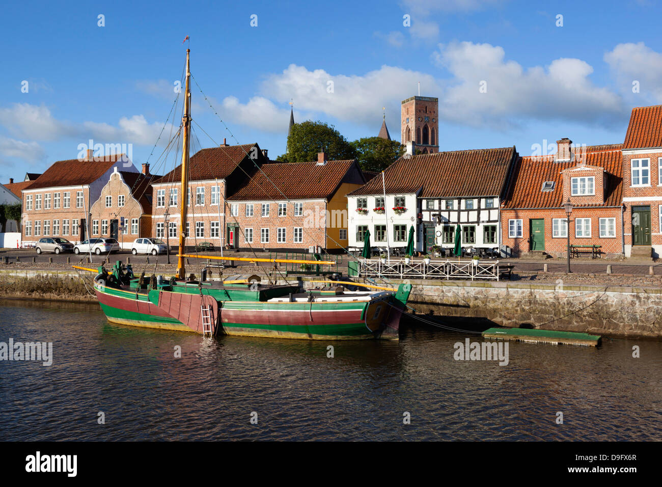 Riverfront houses and tower of Ribe Domkirke, Ribe, Jutland, Denmark, Scandinavia Stock Photo