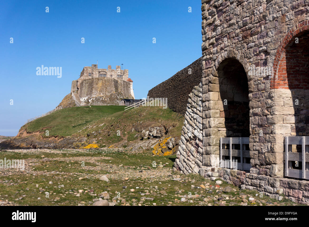 Lindisfarne castle and Lime Kiln on Holy Island, Northumberland, England Stock Photo