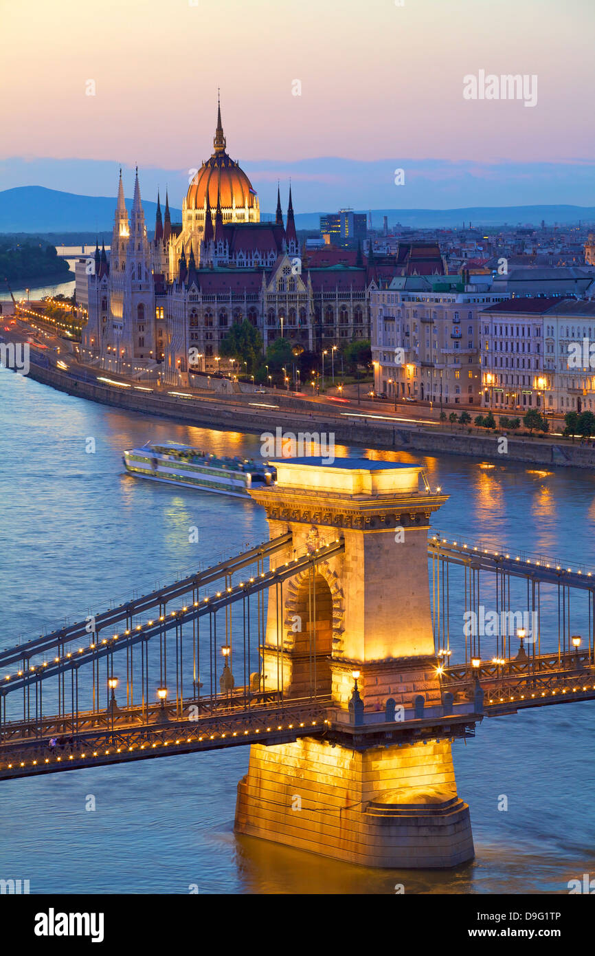 Chain Bridge, River Danube and Hungarian Parliament at dusk, UNESCO World Heritage Site, Budapest, Hungary Stock Photo