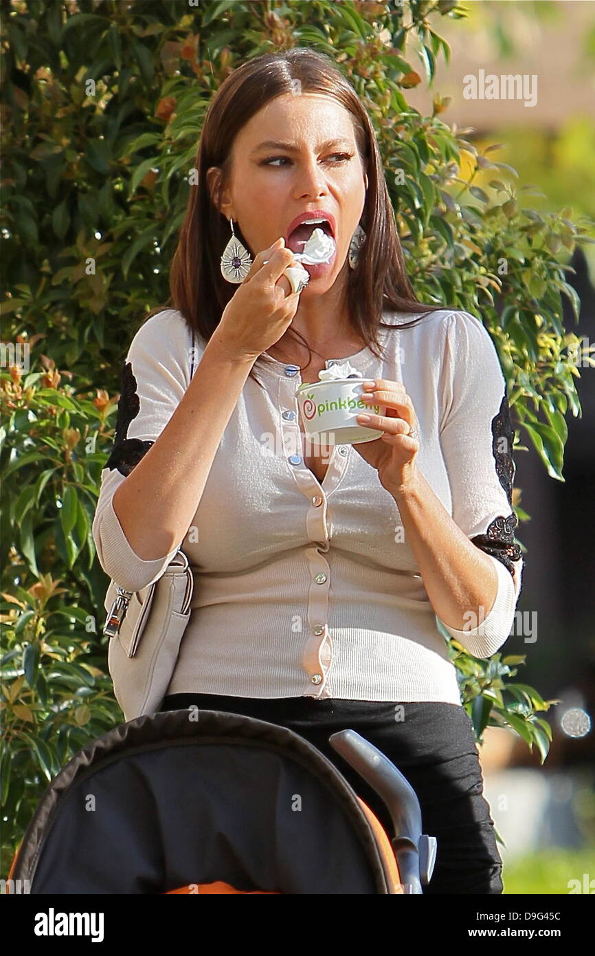 Sofia Vergara on the set of 'Modern Family'. In between takes she enjoys a Pinkberry ice cream. Glendale, California - 08.03.11 Stock Photo