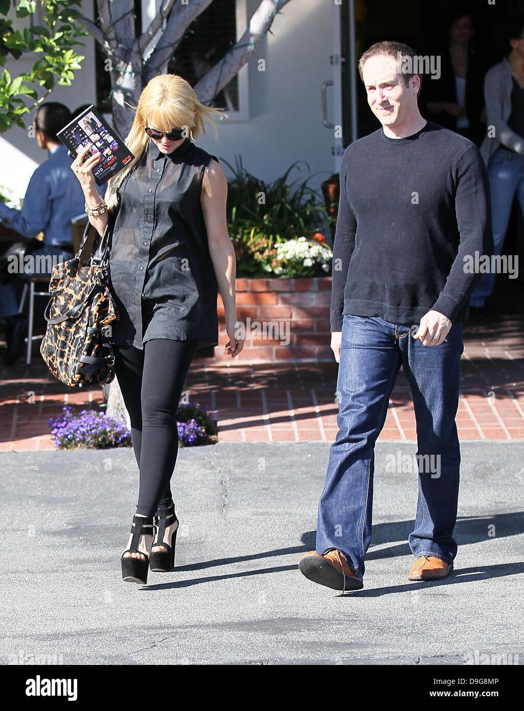 Mena Suvari shopping at Fred Segal in West Hollywood with a companion