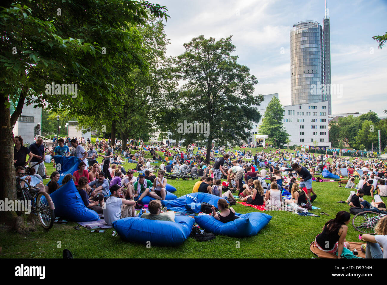 Electronic music festival in a public city park, summer festival in Essen, Germany. Picnic and electronic sound. Stock Photo