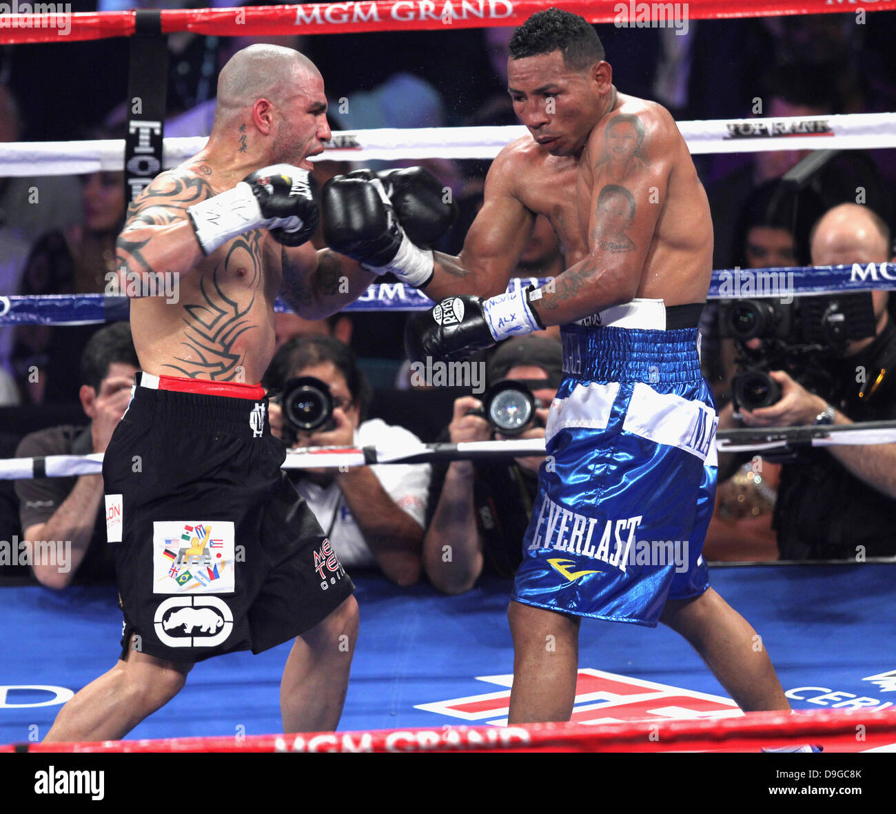 Miguel Cotto and Ricardo Mayorga Puerto Rico's Miguel Cotto retained