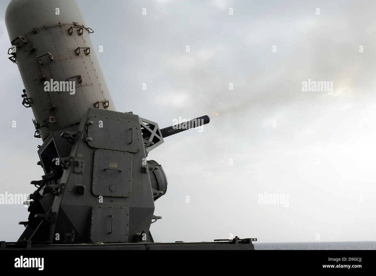 A close-in weapons system is fired aboard USS Makin Island. Stock Photo