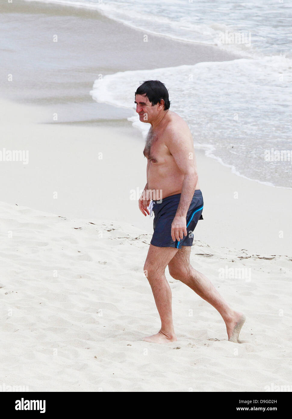 American billionaire Peter Brant and his family spend time on the beach ...
