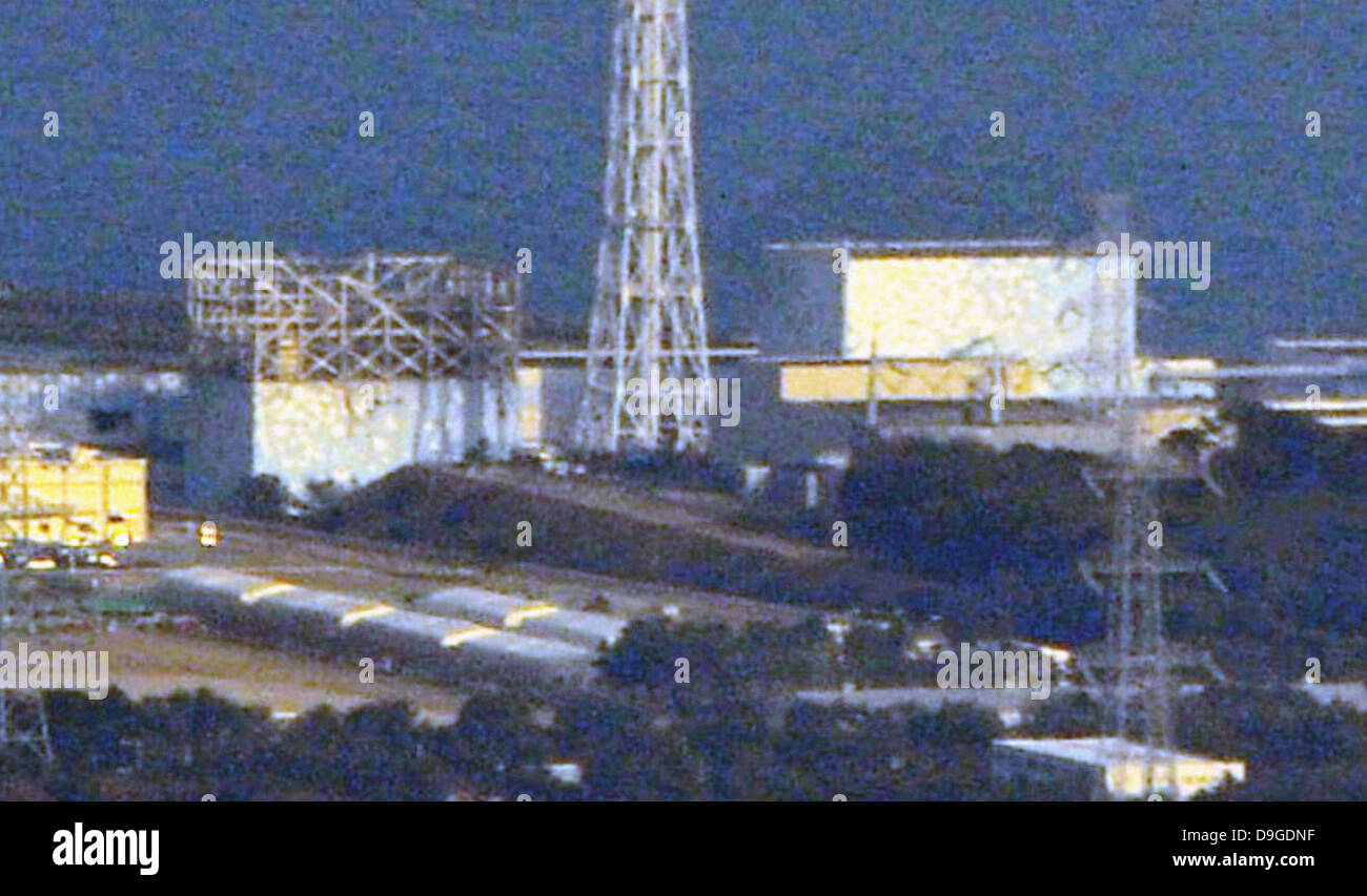 The quake-hit Fukushima No. 1 nuclear power plant's No. 1 (L) and No. 2 ...