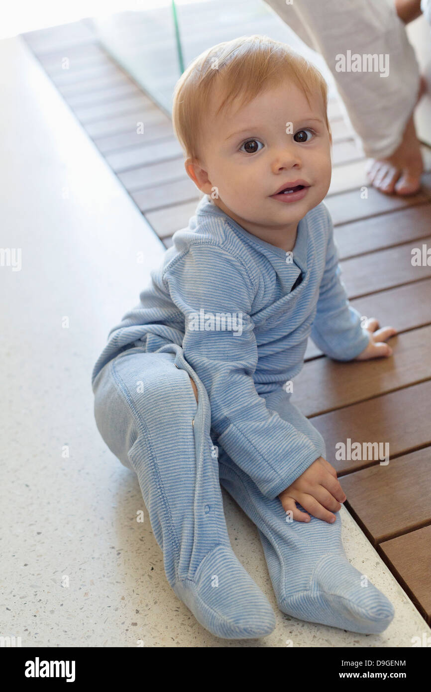 Boy sitting floor side view hi-res stock photography and images - Alamy