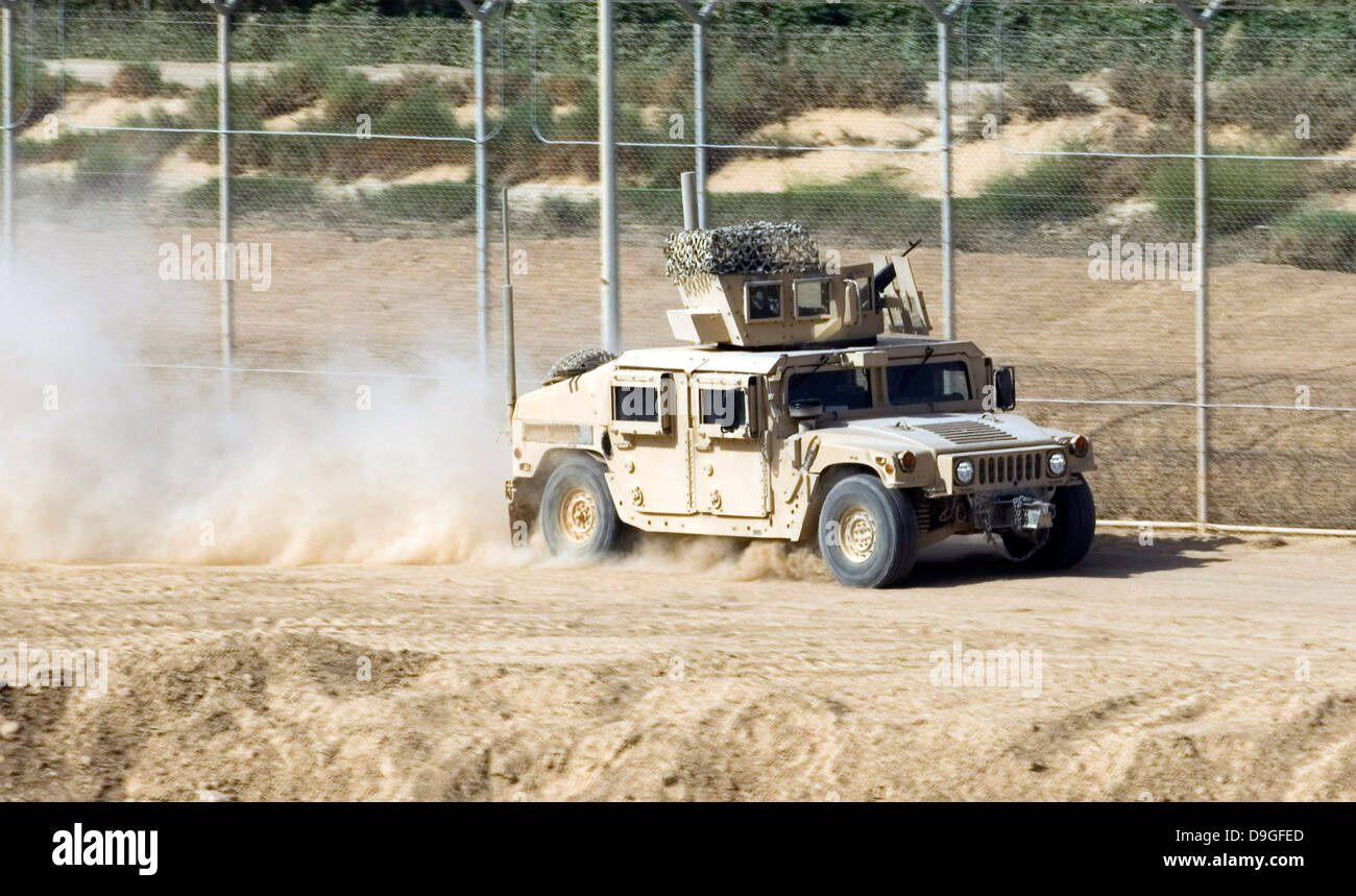 A M1114 Humvee patrols the perimeter of Joint Bae Balad, Iraq. Stock Photo