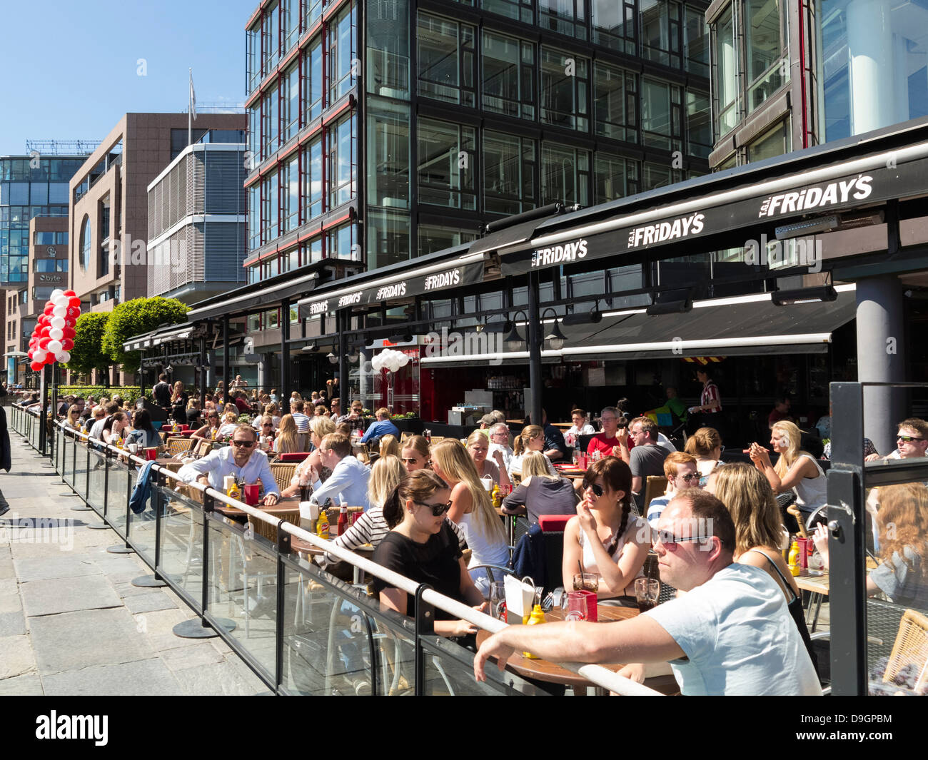 Oslo - TGI Fridays bar cafe restaurants along the waterfront at Oslo Harbor, Norway, Europe Stock Photo