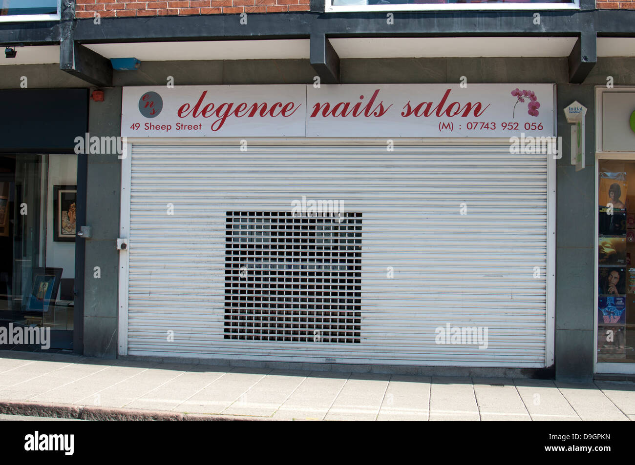 Spelling mistake on nails salon, elegence instead of elegance Stock Photo