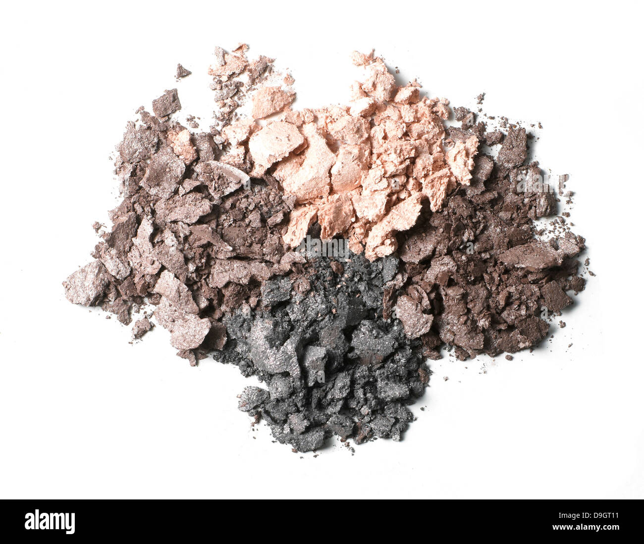 pile of loose dark eyeshadow powder cut out onto a white background Stock Photo