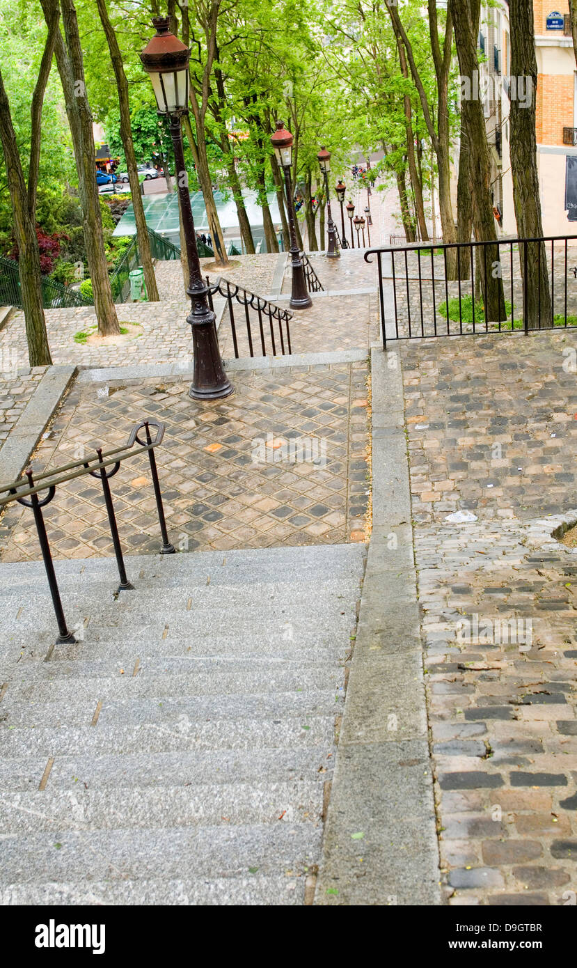 tiled steps butte walk up to top of Basilica Sacre Coeur Sacred Heart in Montmartre Paris France Stock Photo