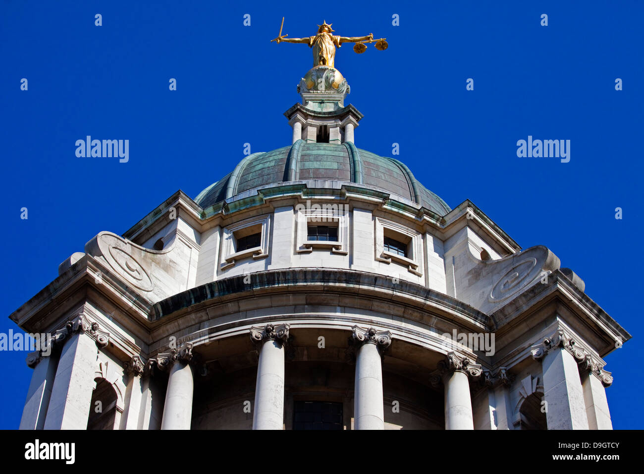 Looking up at the Lady Justice statue on top of the Old Bailey in