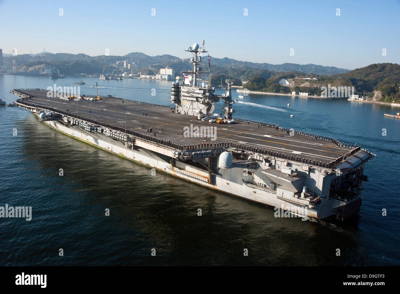 The aircraft carrier USS George Washington transits Tokyo Bay. Stock Photo