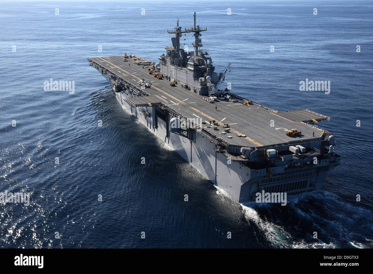The amphibious assault ship USS Kearsarge transits the Atlantic Ocean. Stock Photo