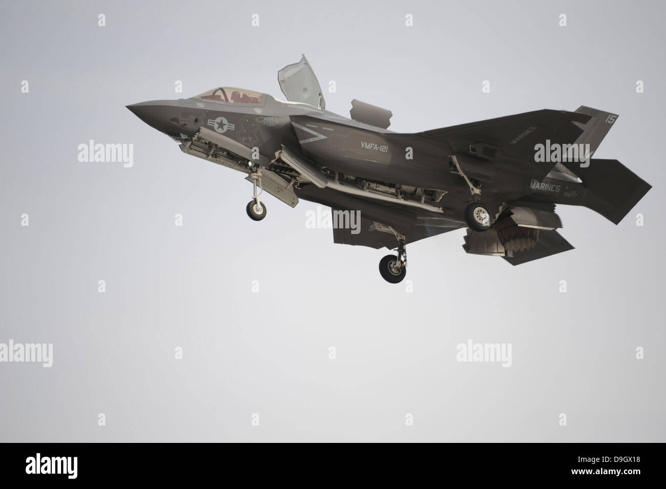 An F-35B Lightning II Joint Strike Fighter prepares to make a vertical landing. Stock Photo