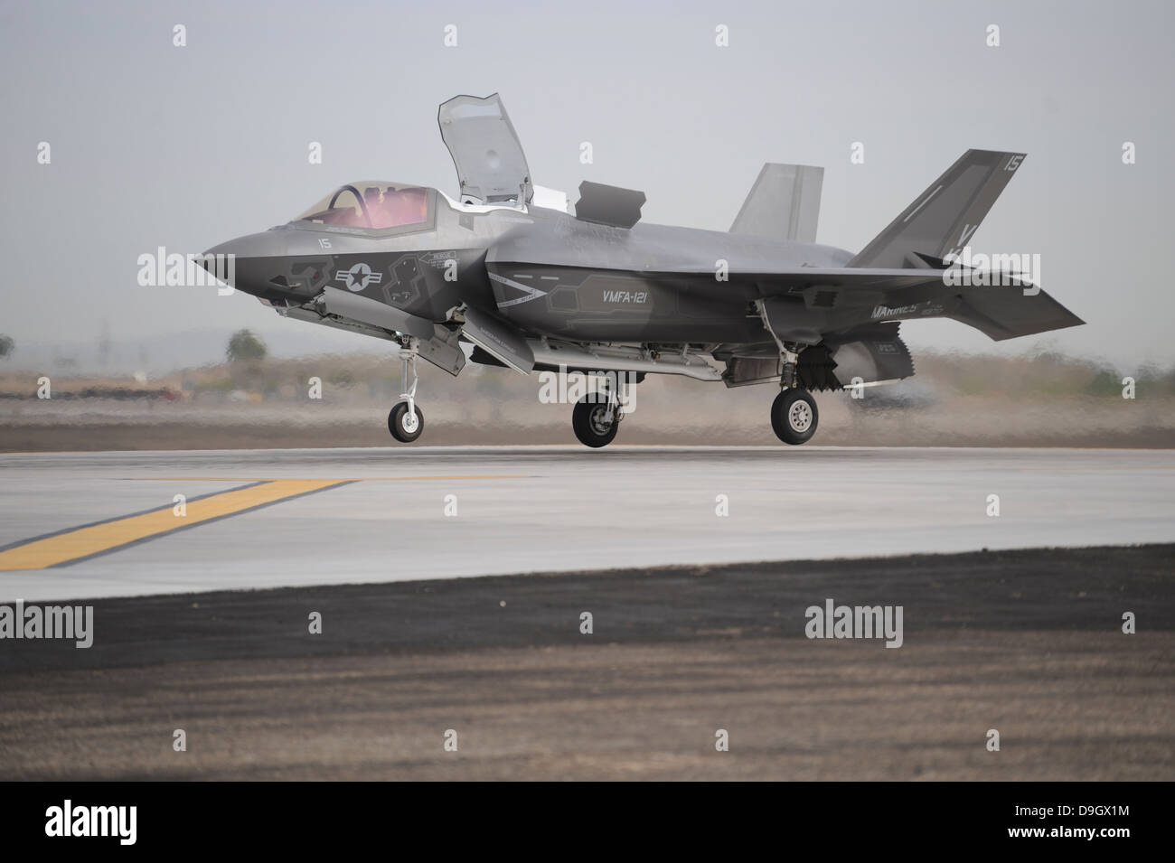 An F-35B Lightning II Joint Strike Fighter prepares to make a vertical landing. Stock Photo