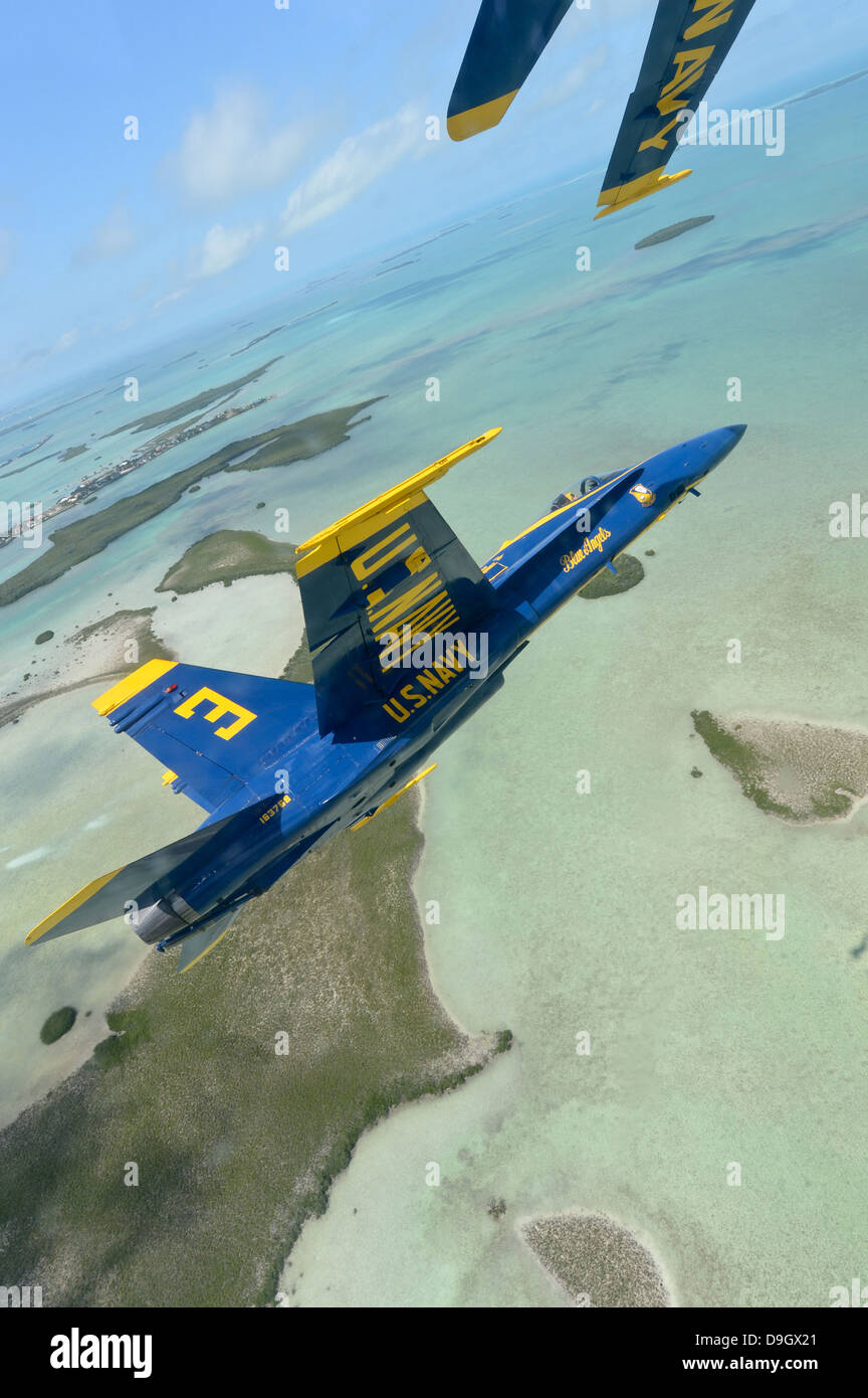 An F/A18 of the Blue Angels flies over the Florida Keys Stock