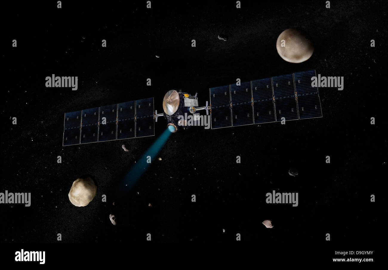 Artist's concept of the Dawn spacecraft in orbit around the large asteroid Vesta and the dwarf planet Ceres. Stock Photo