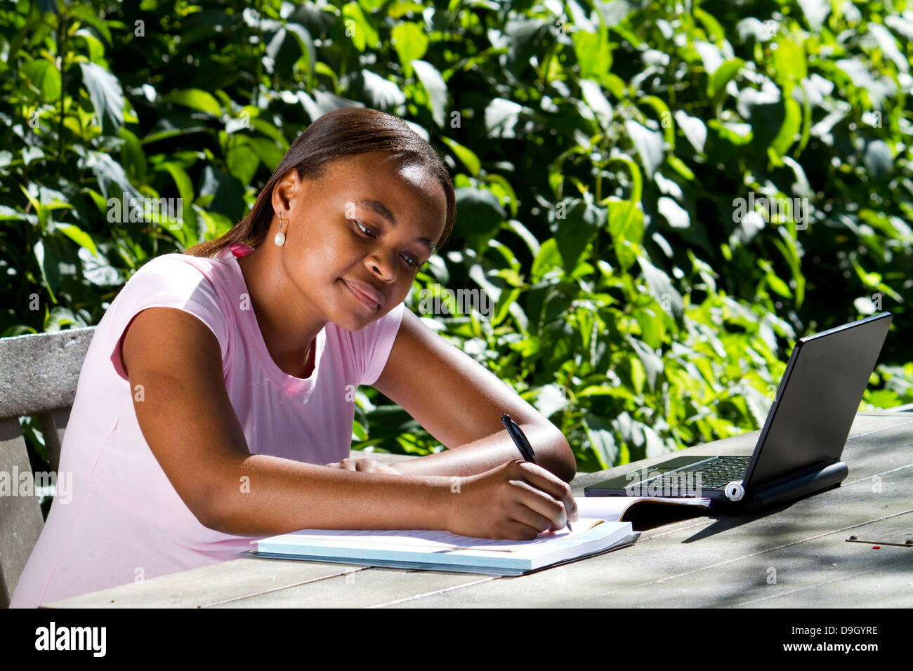 female African college student studying outdoors Stock Photo - Alamy