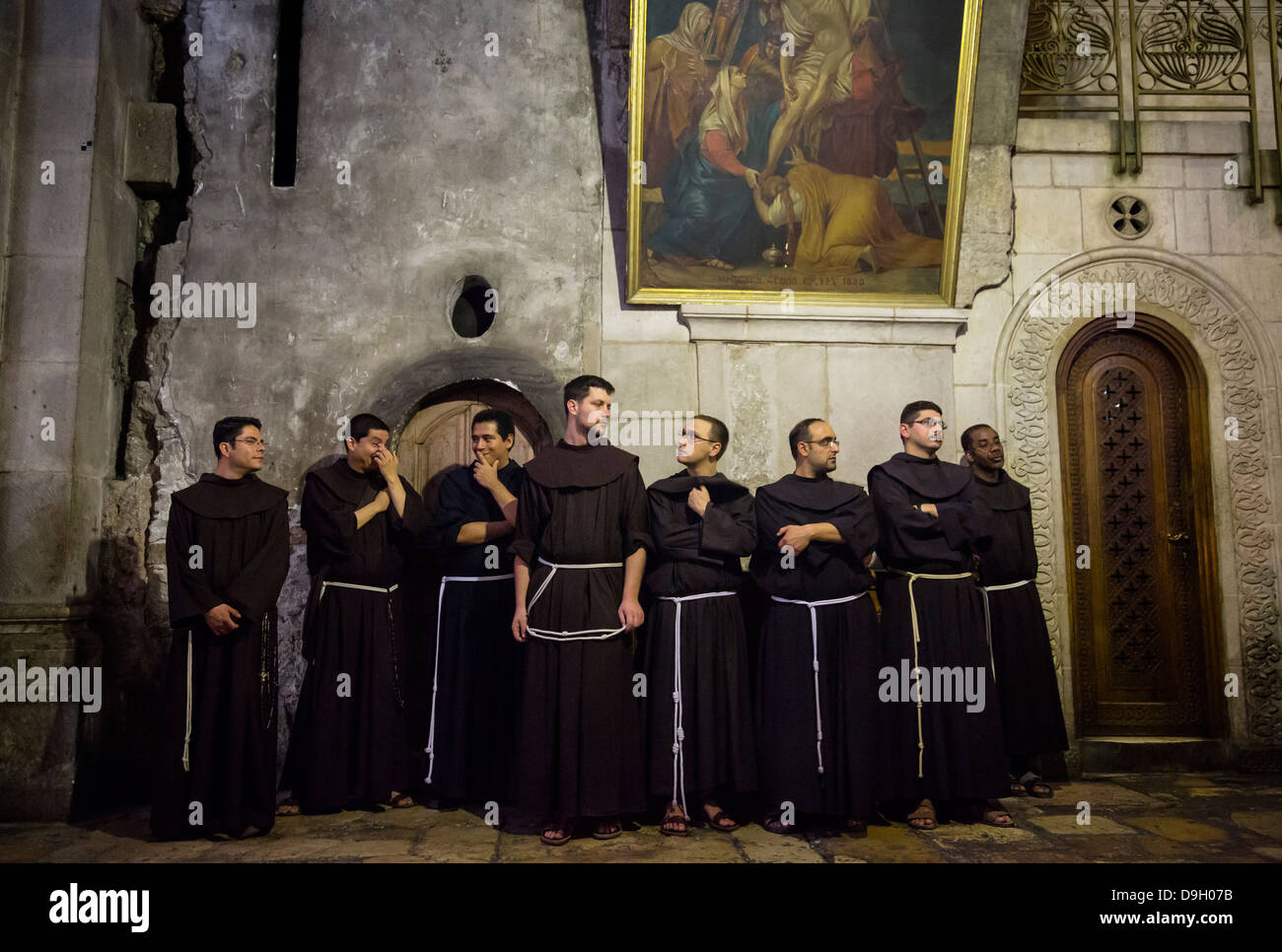 Franciscan monks at the church of the Holy Sepulchre in the old city, Jerusalem, Israel. Stock Photo